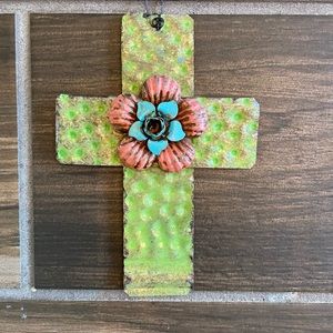 Metal cross with centered flower - vintage finish